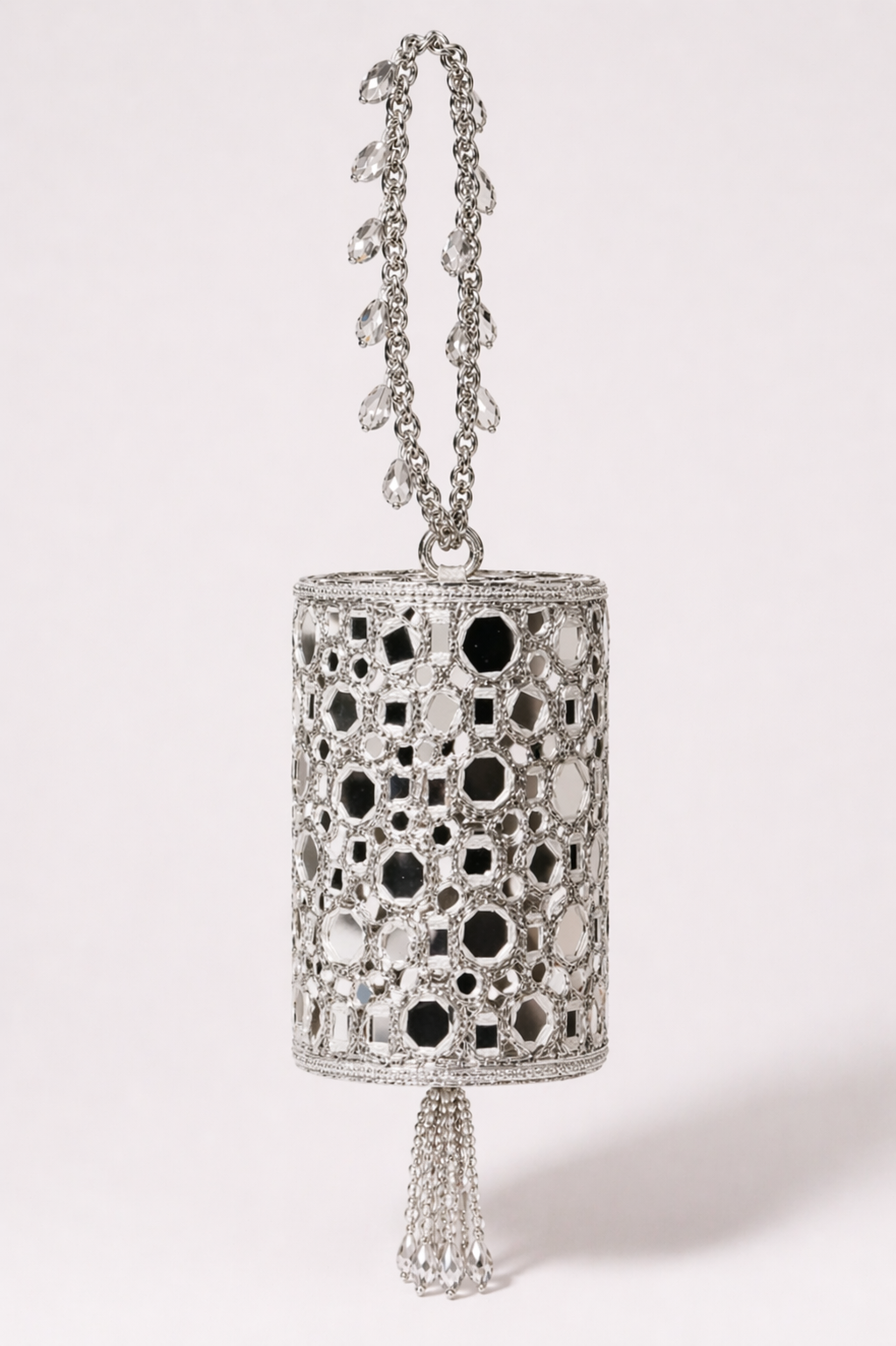Luxury silver mirror embellished evening potli bag with crystal tassel handle by House of Siora