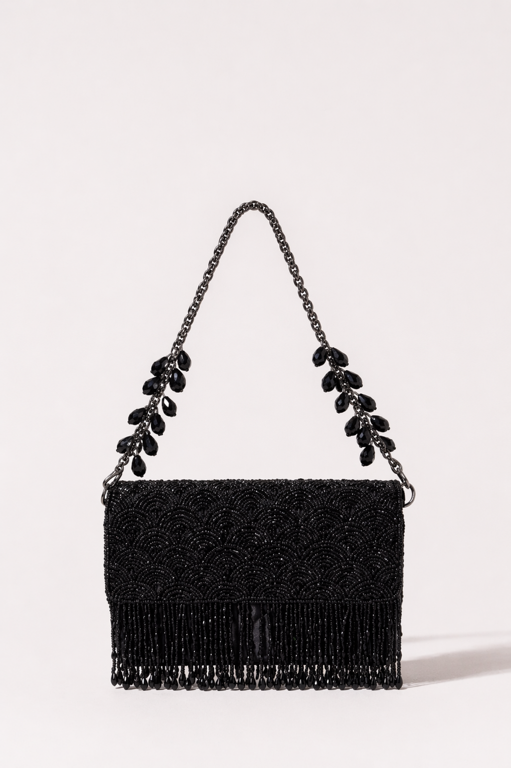 Black beaded party purse inspired by glamorous cocktail nights and festive celebrations
