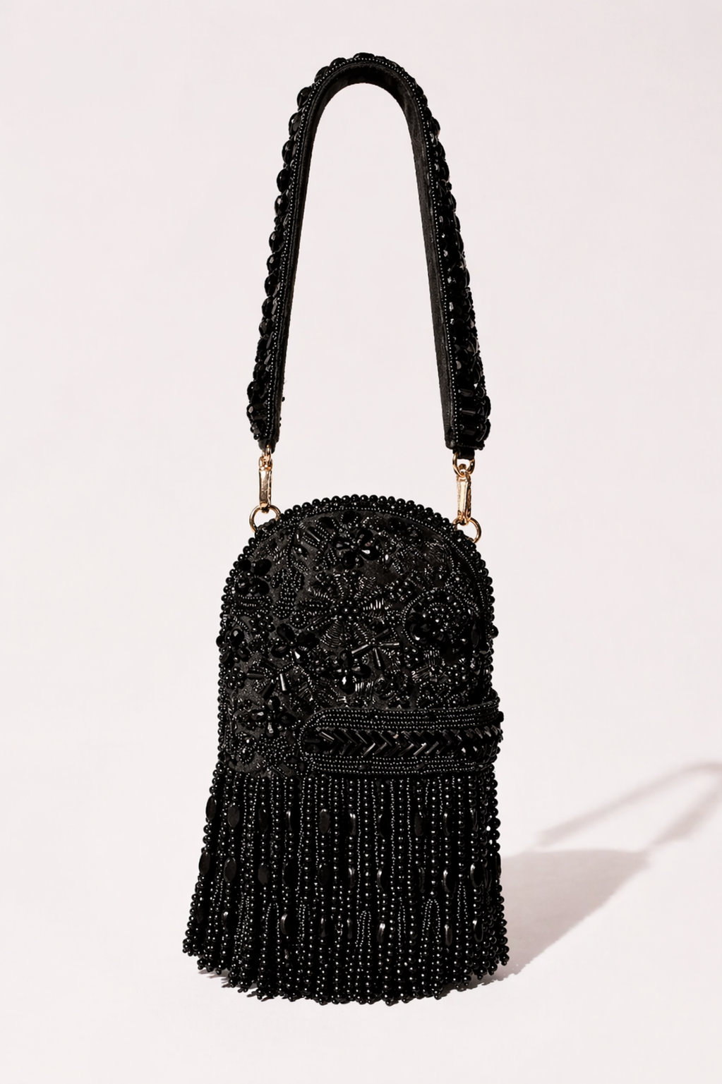 Black beaded fringe handbag with intricate embellishments and dramatic detailing