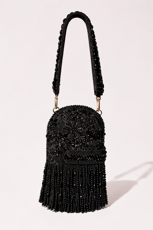 Black beaded fringe handbag with intricate embellishments and dramatic detailing