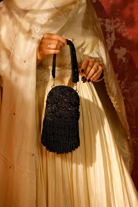 Handcrafted black shoulder bag designed for cocktail nights and festive celebrations