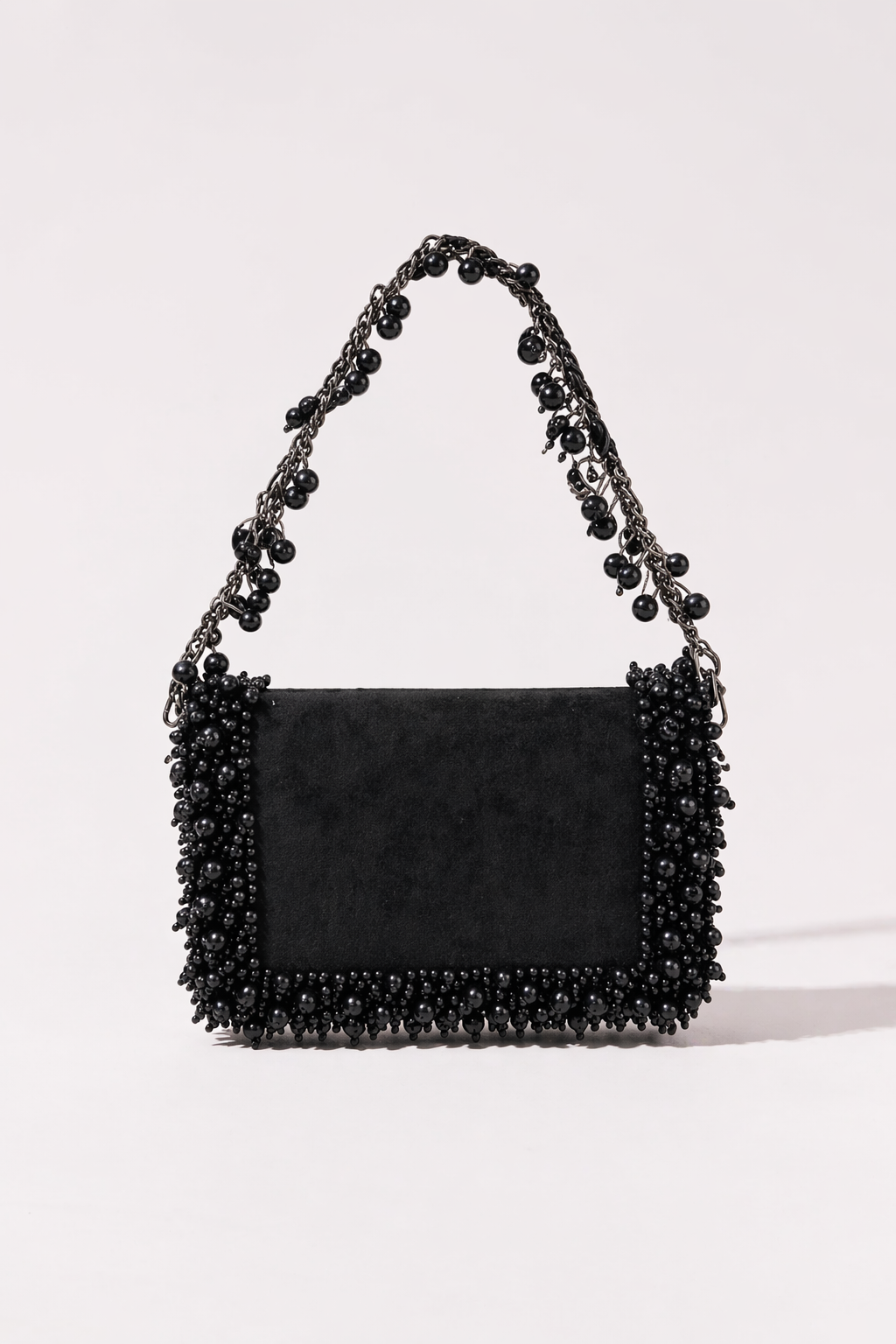Black evening party handbag inspired by glamorous celebrations and cocktail styling