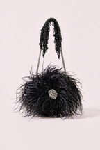 Black feather party bag with dramatic texture and sparkling crystal centerpiece