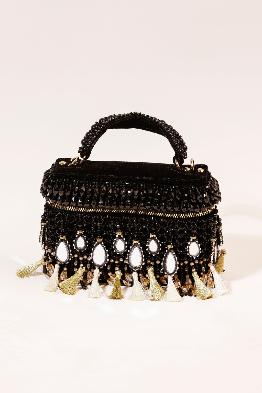 Black mirror embellished handbag with statement tassels and festive detailing