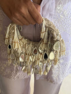 Boho glam party bag with cascading pearl tassels and statement mirror embellishments