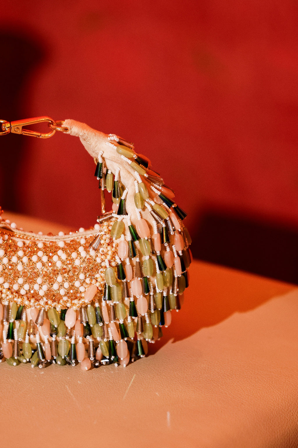 Pearl and crystal detailed shoulder bag styled for glamorous festive dressing