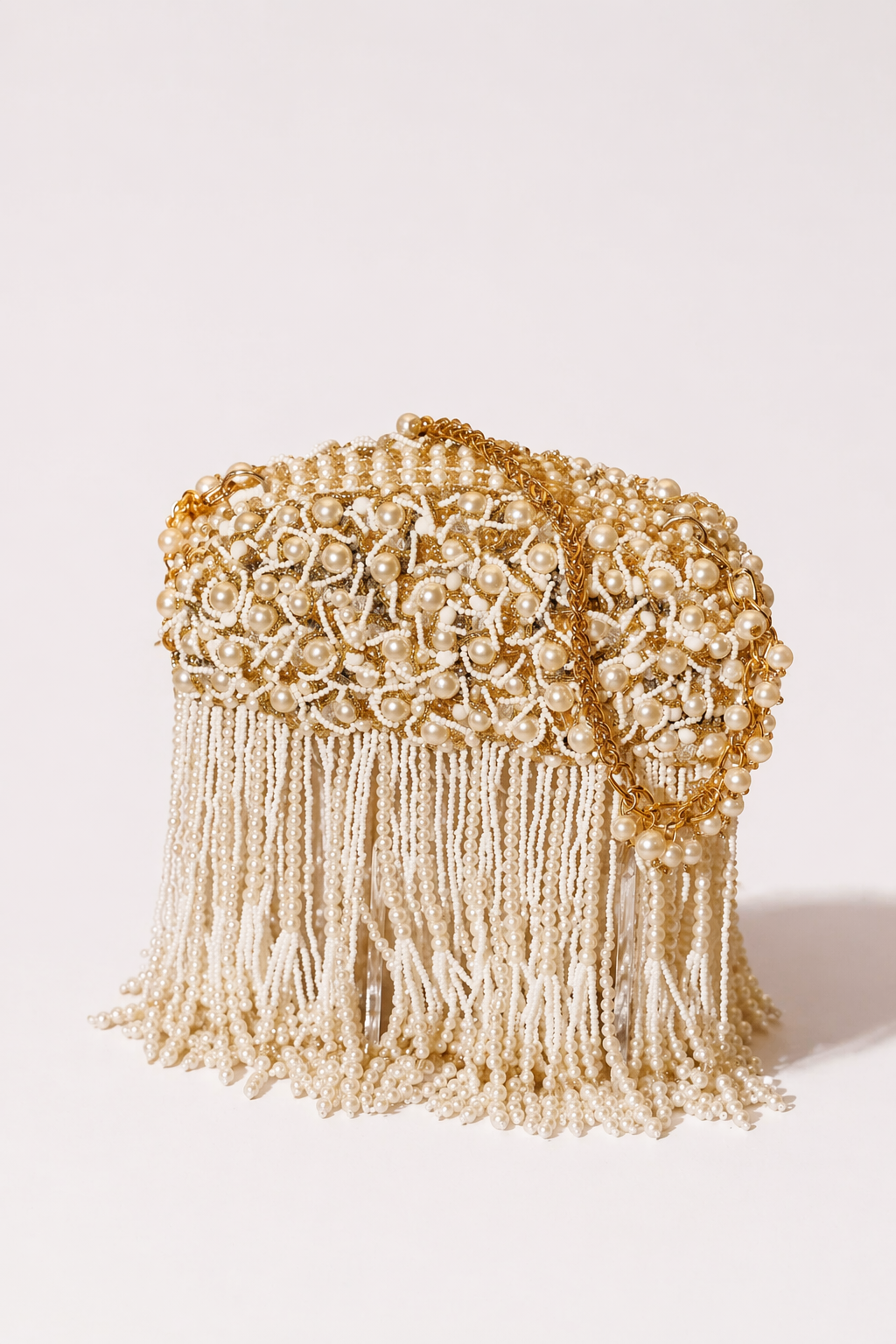 Bridal  handbag with intricate floral bead embroidery and elegant tassel detailing