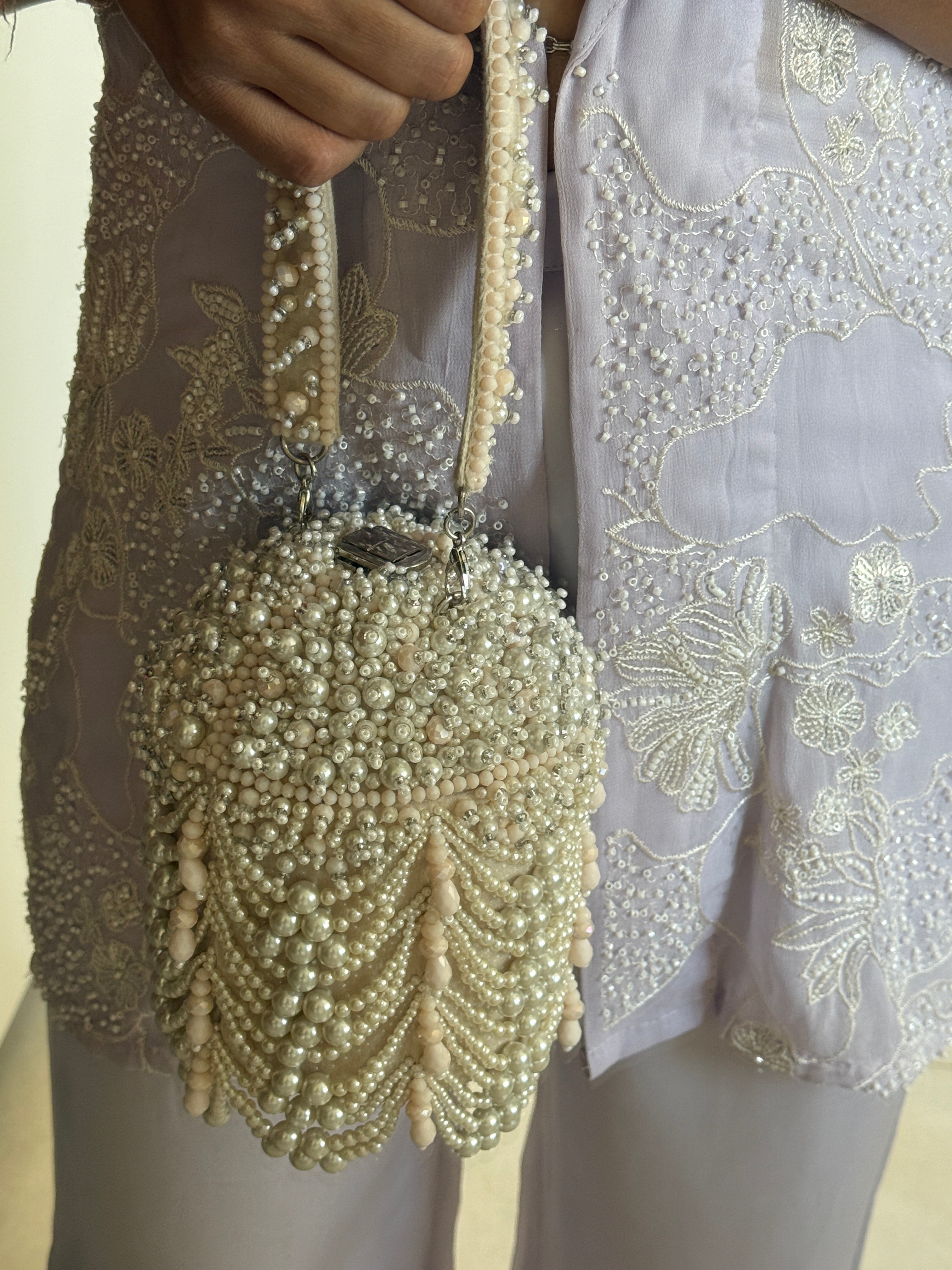 Bridal occasion bag designed beautifully for receptions and elegant festive dressing