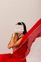 Bridal trousseau purse featuring handcrafted beadwork and intricate geometric patterns