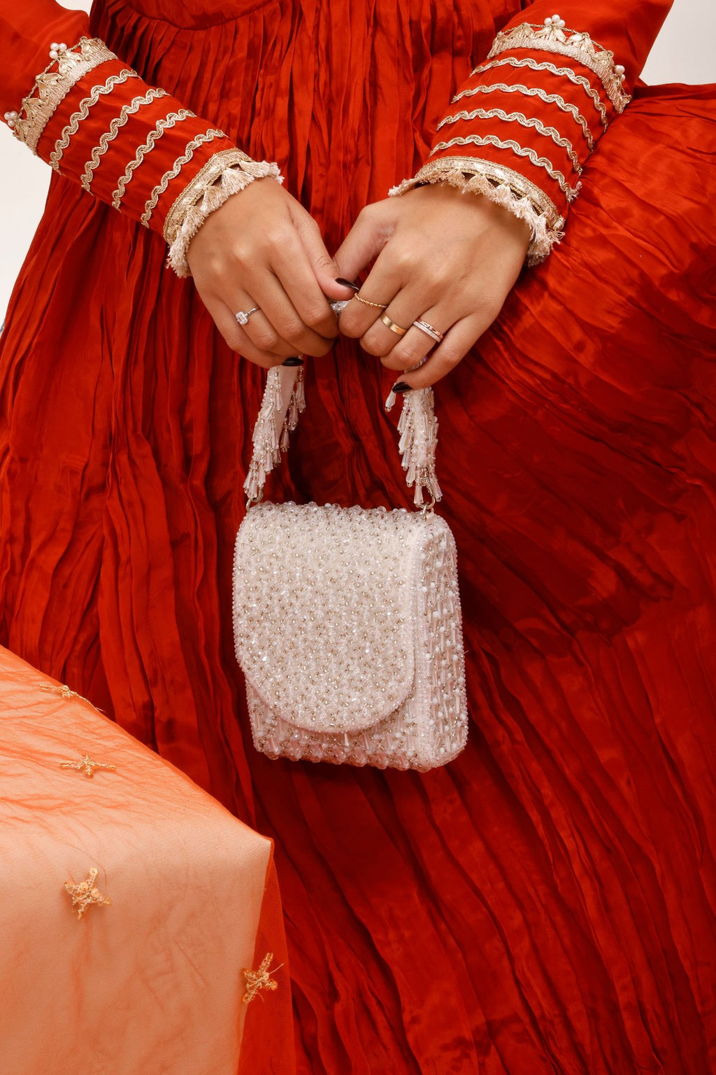 Bridal trousseau purse inspired by elegant occasion wear and luxury craftsmanship