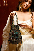 Gift-worthy bridal handbag styled beautifully for weddings and trousseau collections