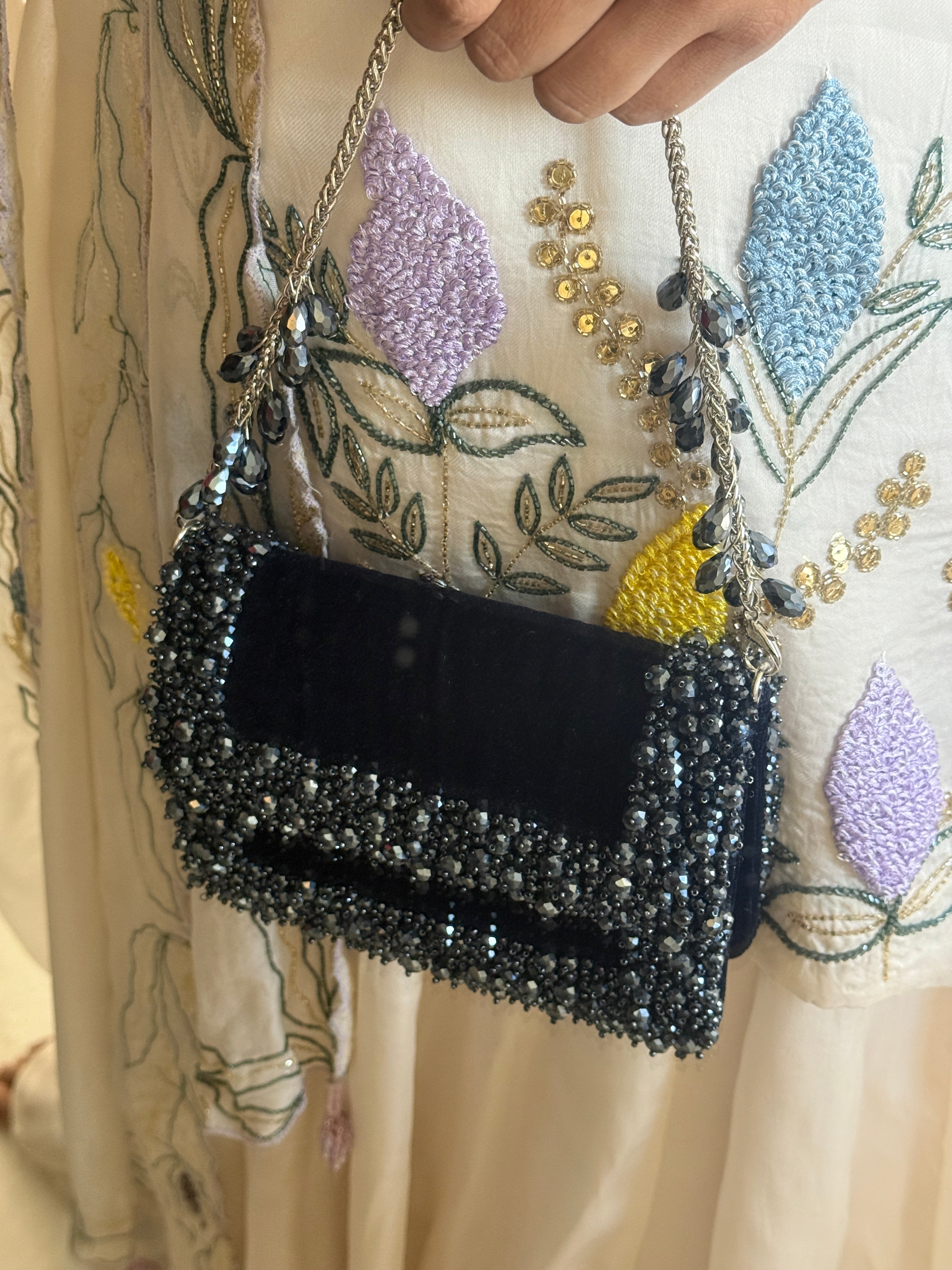 Charcoal blue occasion party bag styled perfectly for celebrations and elegant night-out looks