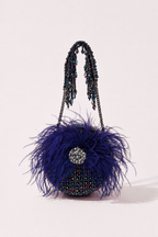 Cobalt blue feather handbag with shimmering crystal embellishments and bold texture