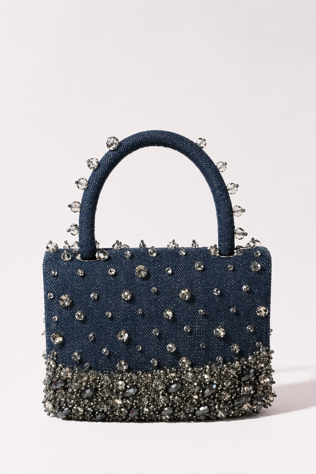 Denim crystal mini handbag with sparkling stud embellishments and modern festive styling