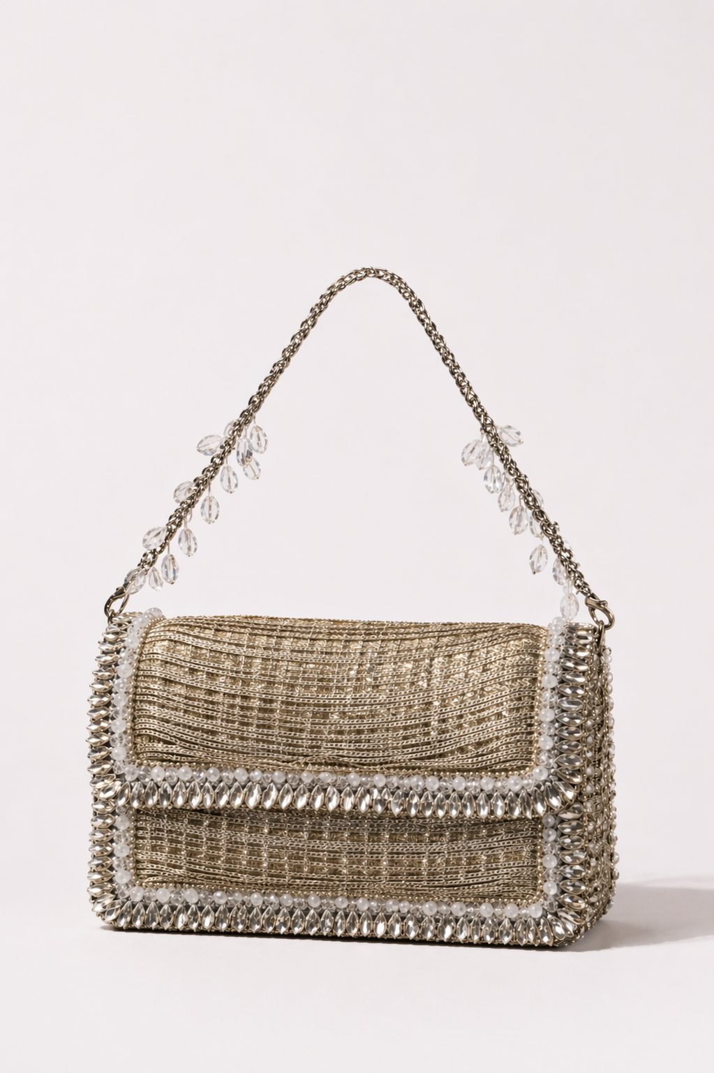 Designer wedding guest clutch with shimmering embellishments and elegant chain detailing