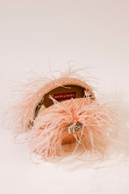 Glamorous blush party handbag inspired by festive fashion and statement accessorising