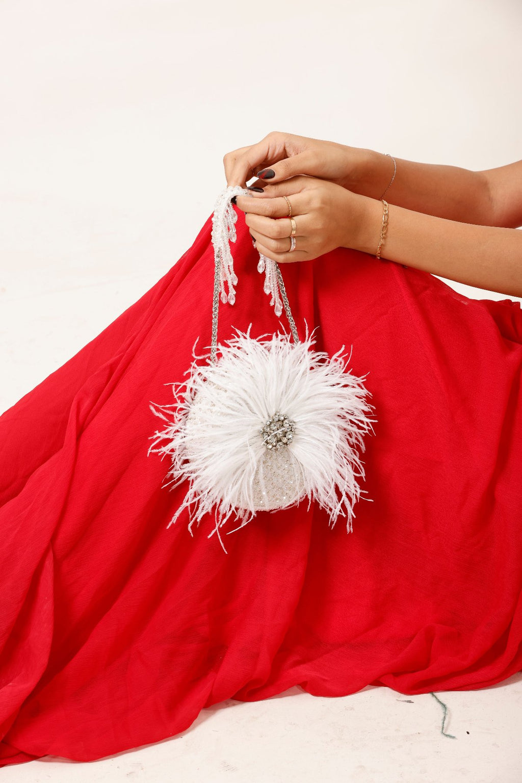 Fluffy statement clutch designed for festive celebrations and glamorous evenings