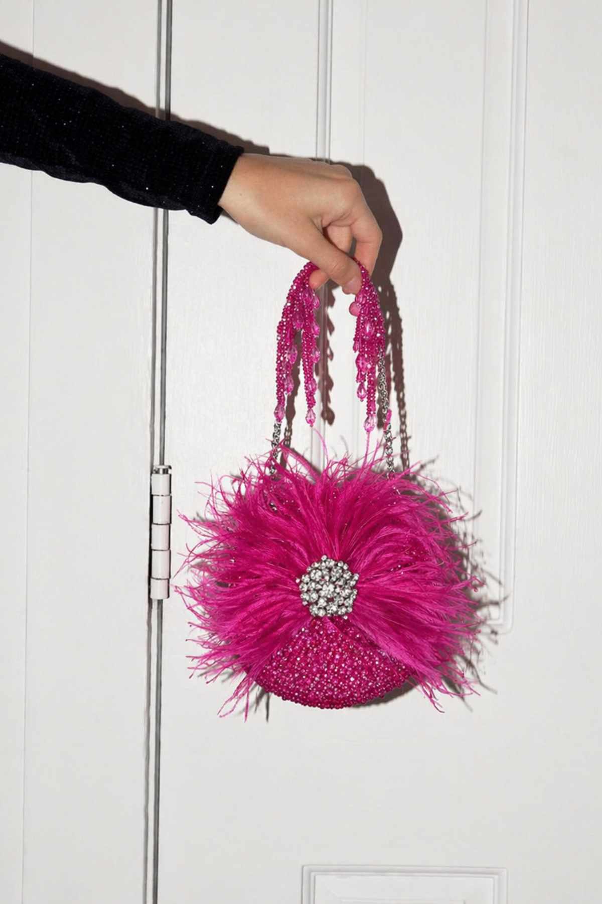 Fuchsia glam evening purse inspired by cocktail celebrations and luxury party styling