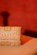 Gift-worthy beaded accessory featuring soft pastel shades and luxe handcrafted detailing