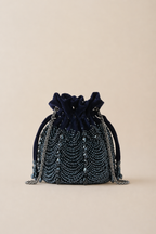 Gift-worthy charcoal blue handbag featuring intricate embellishments and sophisticated party appeal