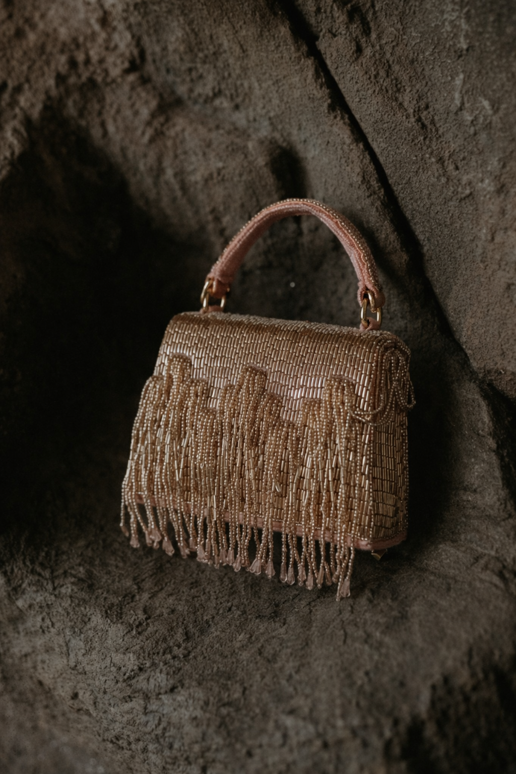 Glam embellished cocktail purse with shimmering texture and elegant structured silhouette