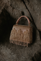 Glam embellished cocktail purse with shimmering texture and elegant structured silhouette