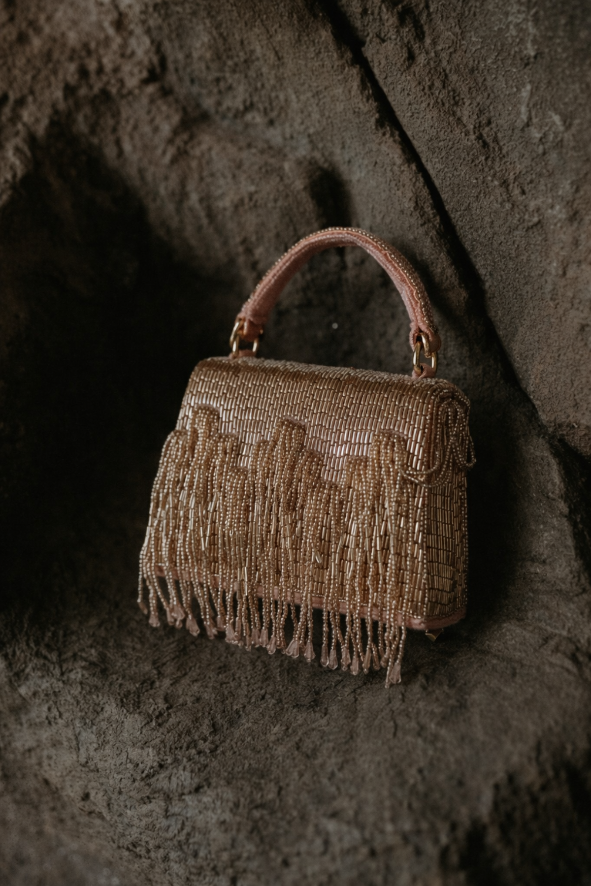 Glam embellished cocktail purse with shimmering texture and elegant structured silhouette