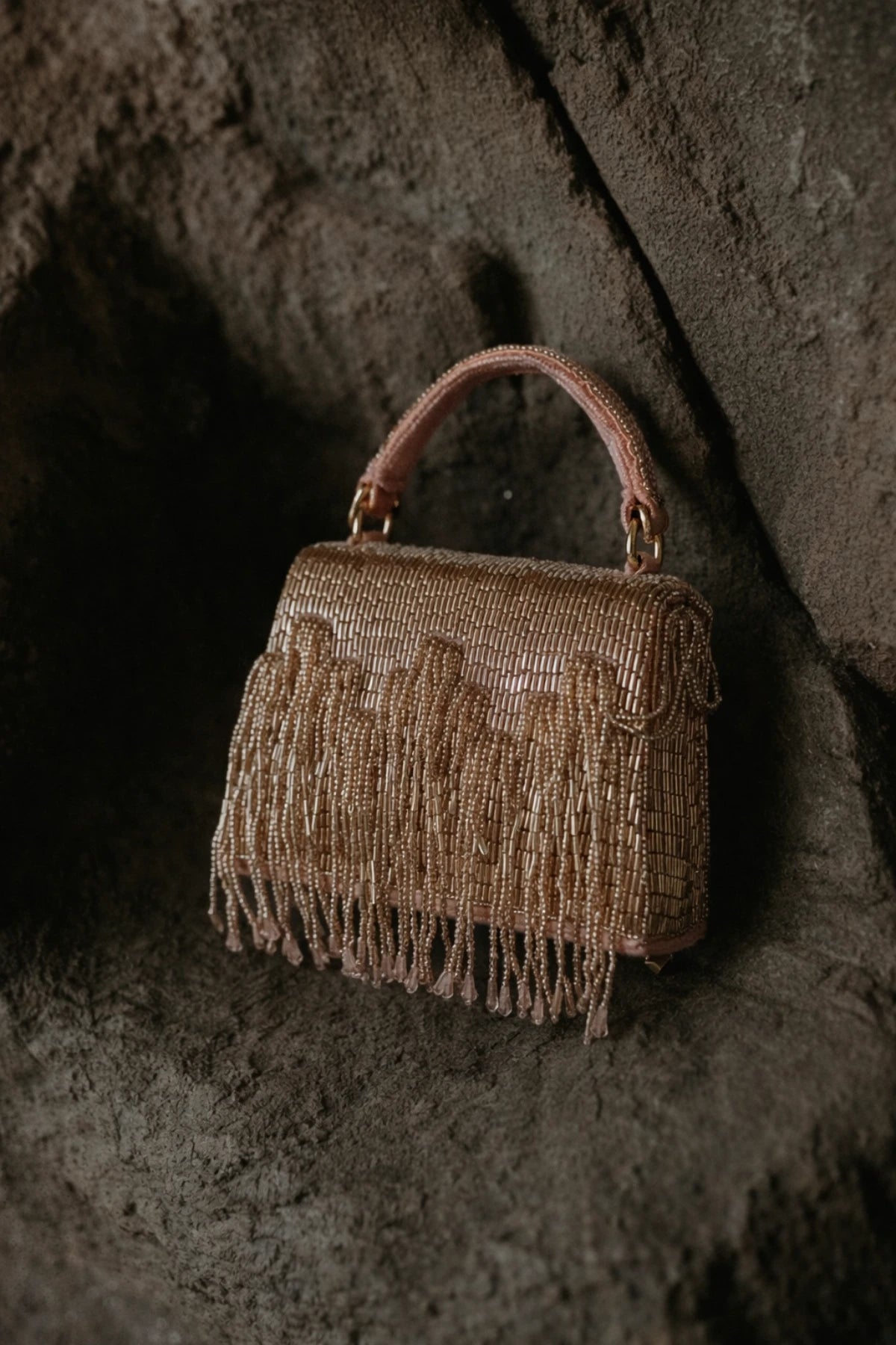 Glam embellished cocktail purse with shimmering texture and elegant structured silhouette