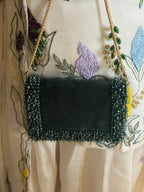 Glam green cocktail handbag with sparkling bead detailing and modern festive styling
