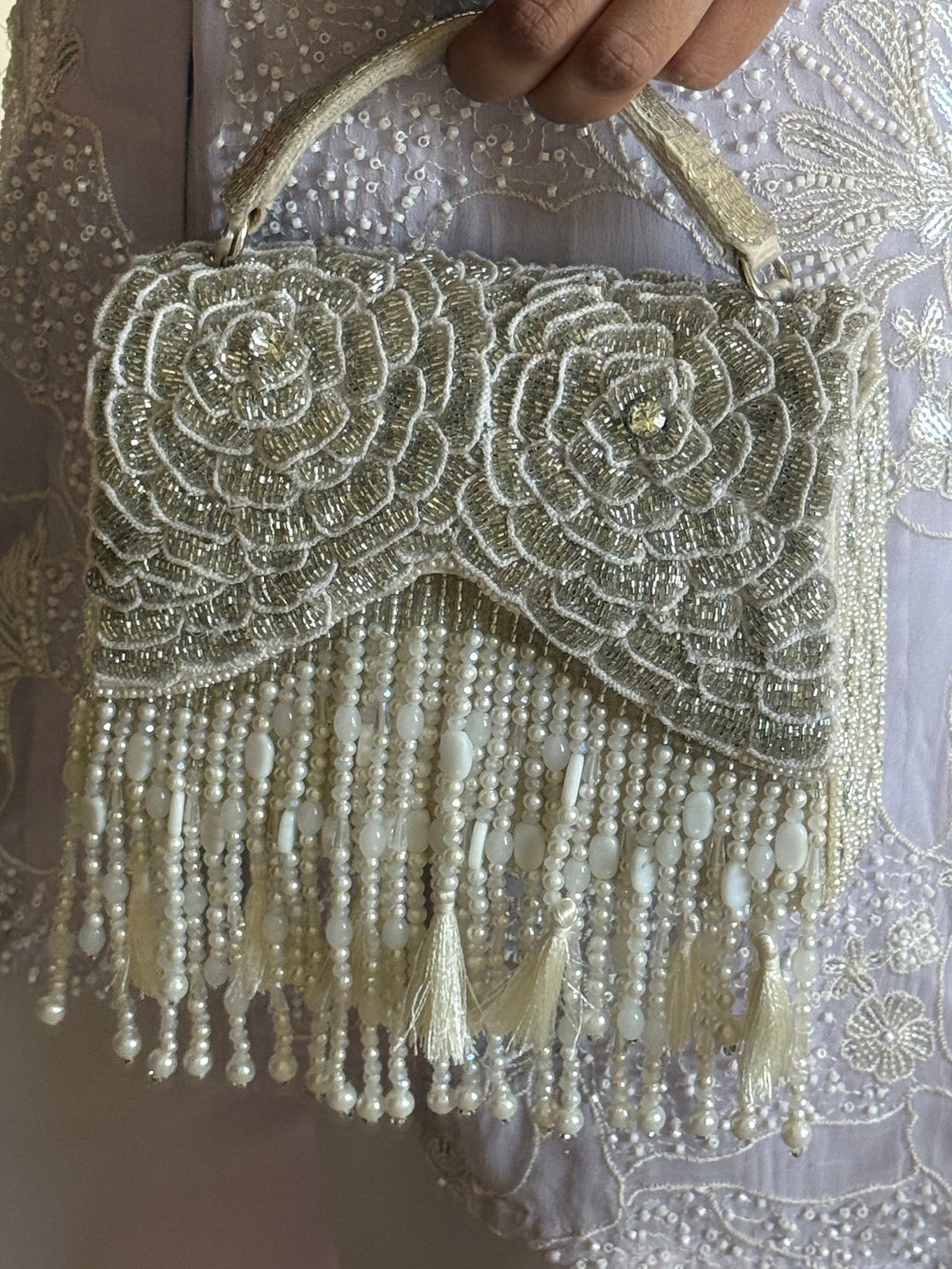 Glam pearl cocktail handbag with statement beadwork and sophisticated shimmer