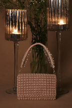 Glam pink vacation handbag with elegant texture and modern feminine appeal