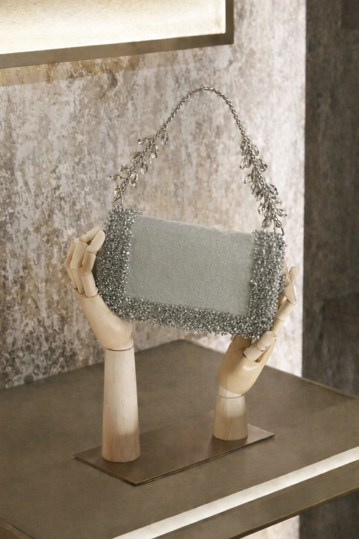 Glam silver cocktail handbag with sparkling crystal detailing and modern evening glamour