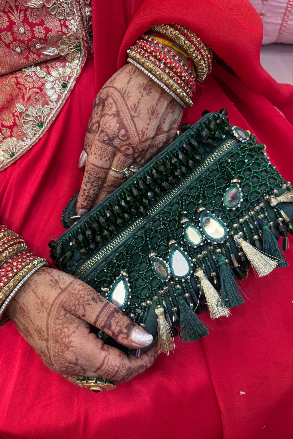 Glam traditional mirror handbag with rich green tones and artisanal craftsmanship