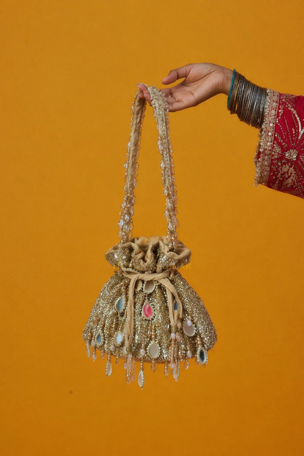 Traditional occasion bag with handcrafted beadwork and statement festive styling