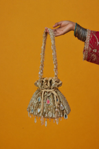 Traditional occasion bag with handcrafted beadwork and statement festive styling