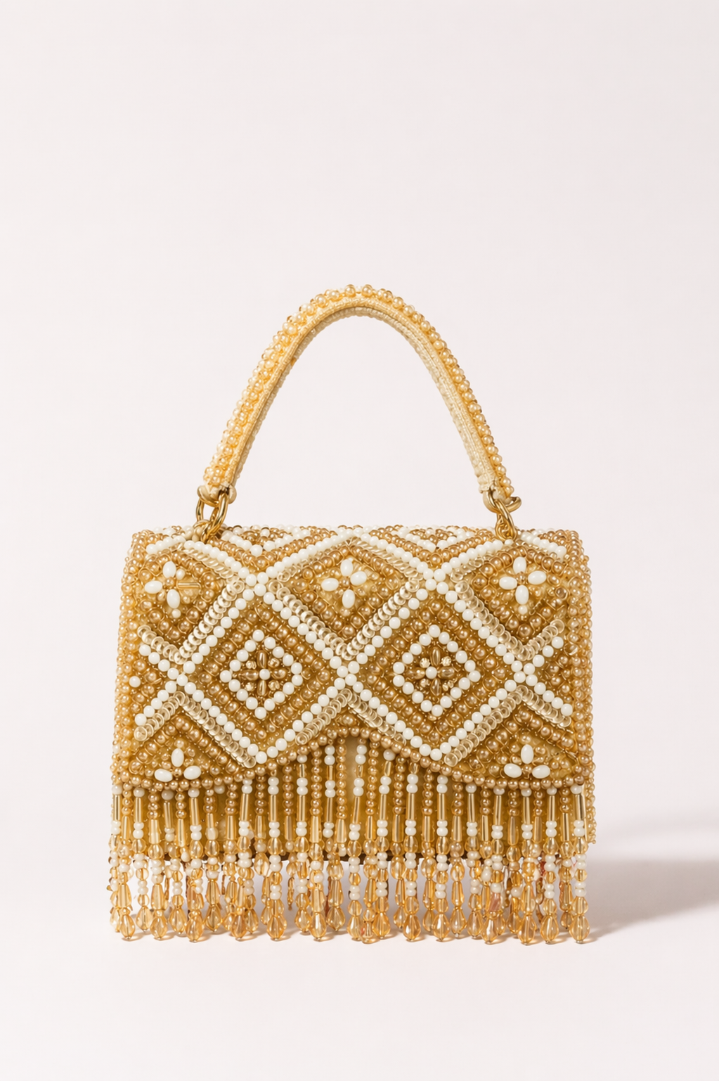 Gold beaded fringe handbag with pearl detailing and handcrafted festive craftsmanship
