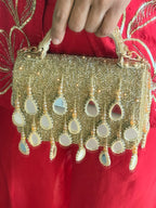 Festive gold party handbag with intricate beadwork and luxe handcrafted glamour