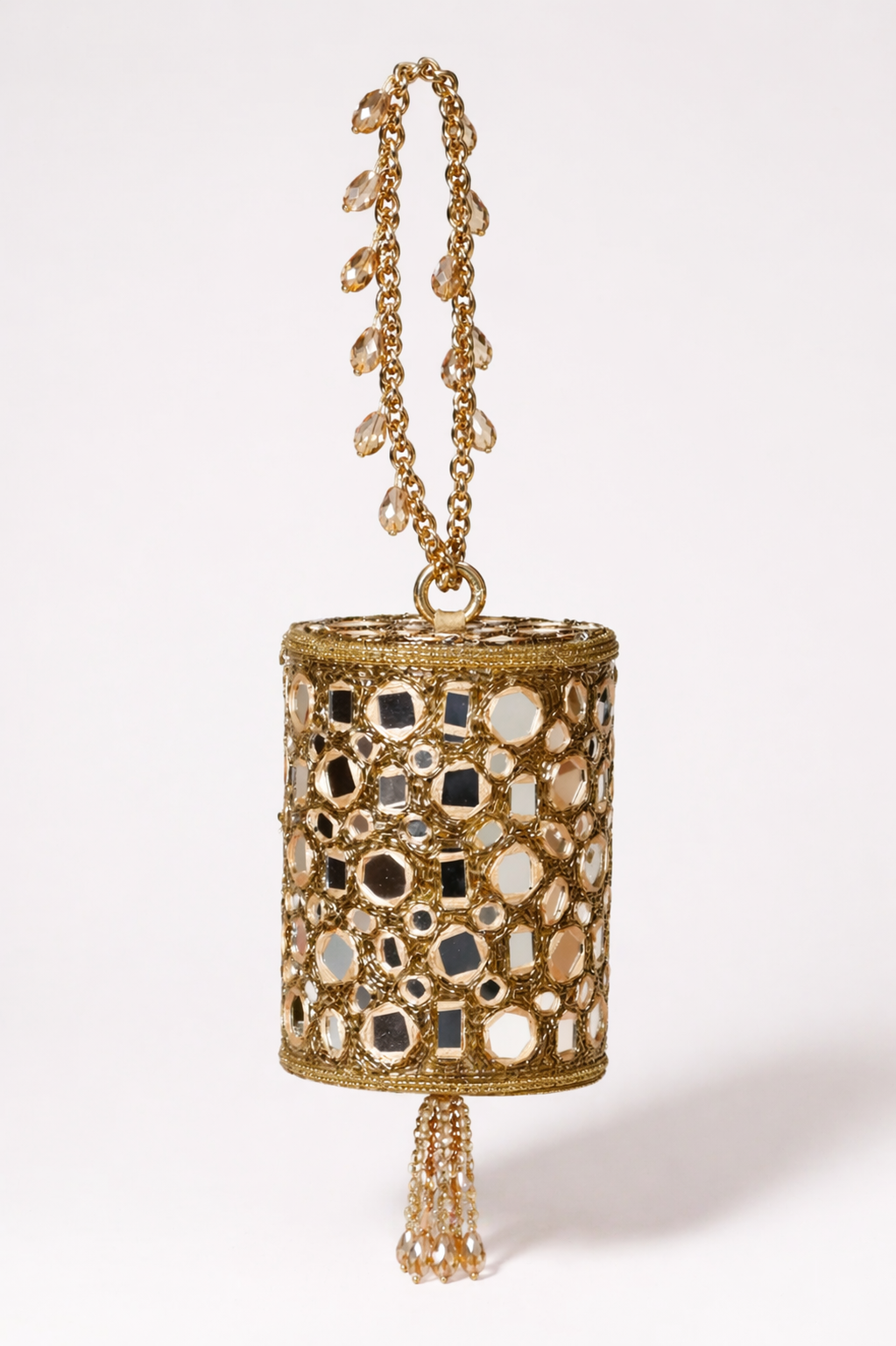 Luxury gold mirror embellished potli bag with crystal tassel detailing