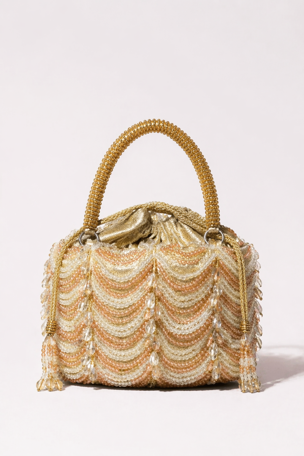 Gold pearl party handbag with cascading bead detailing and luxurious festive craftsmanship