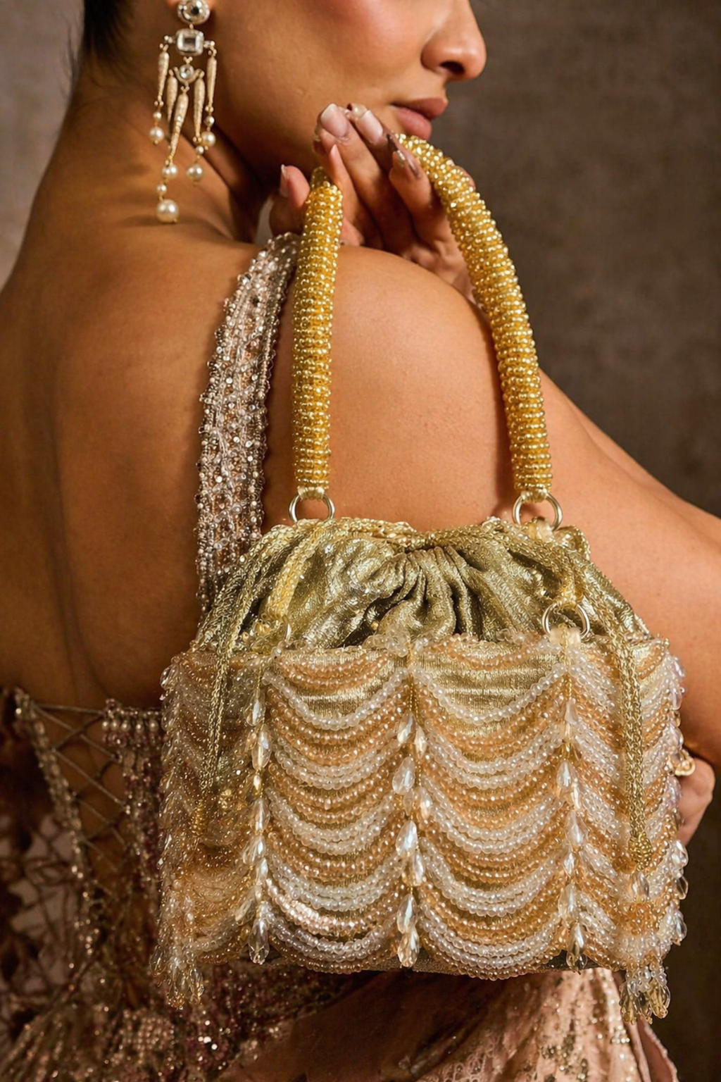 Golden beaded evening purse inspired by glamorous celebrations and cocktail styling
