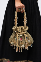 Golden festive drawstring bag inspired by wedding celebrations and traditional glamour