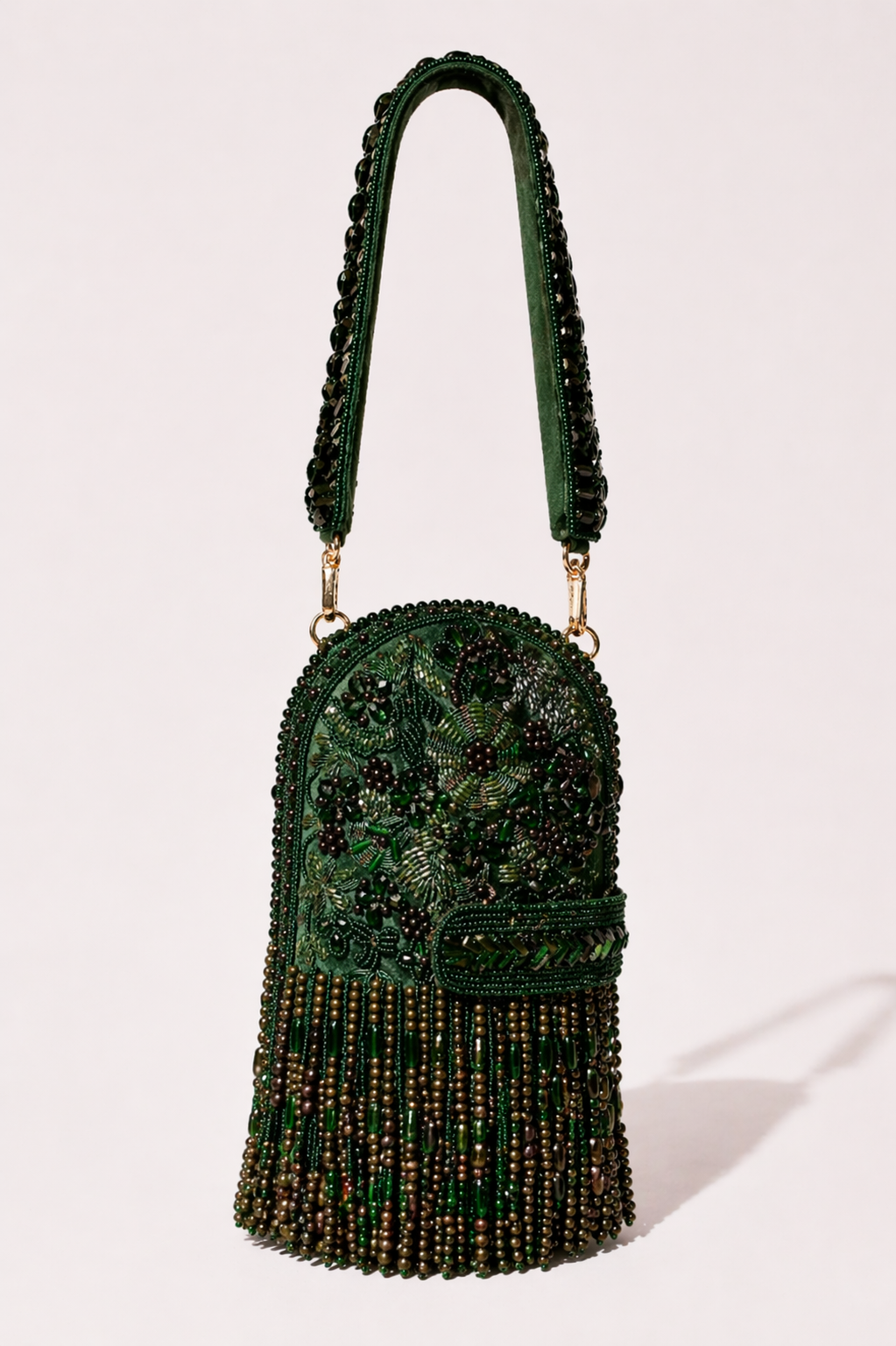 Emerald green beaded fringe handbag with intricate embellishments and rich detailing