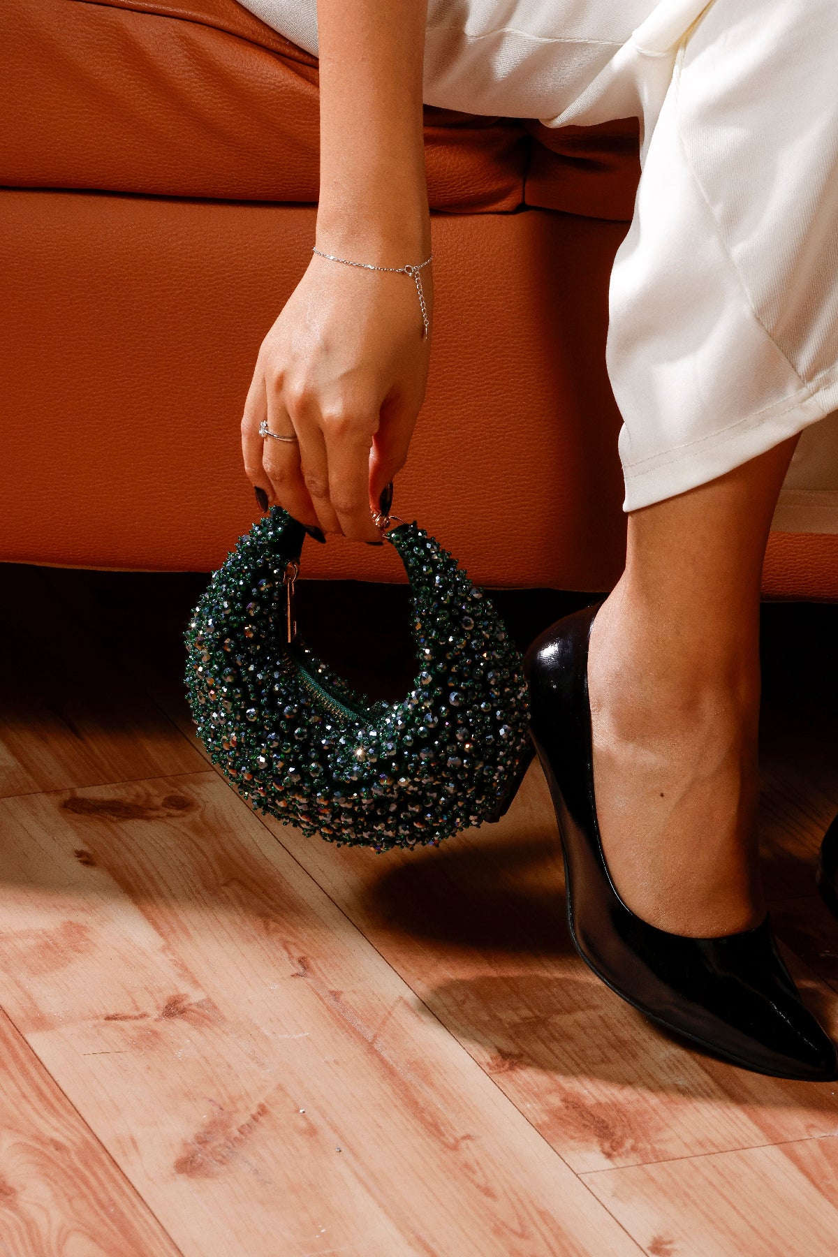 Sparkly green shoulder handbag designed for festive and cocktail styling