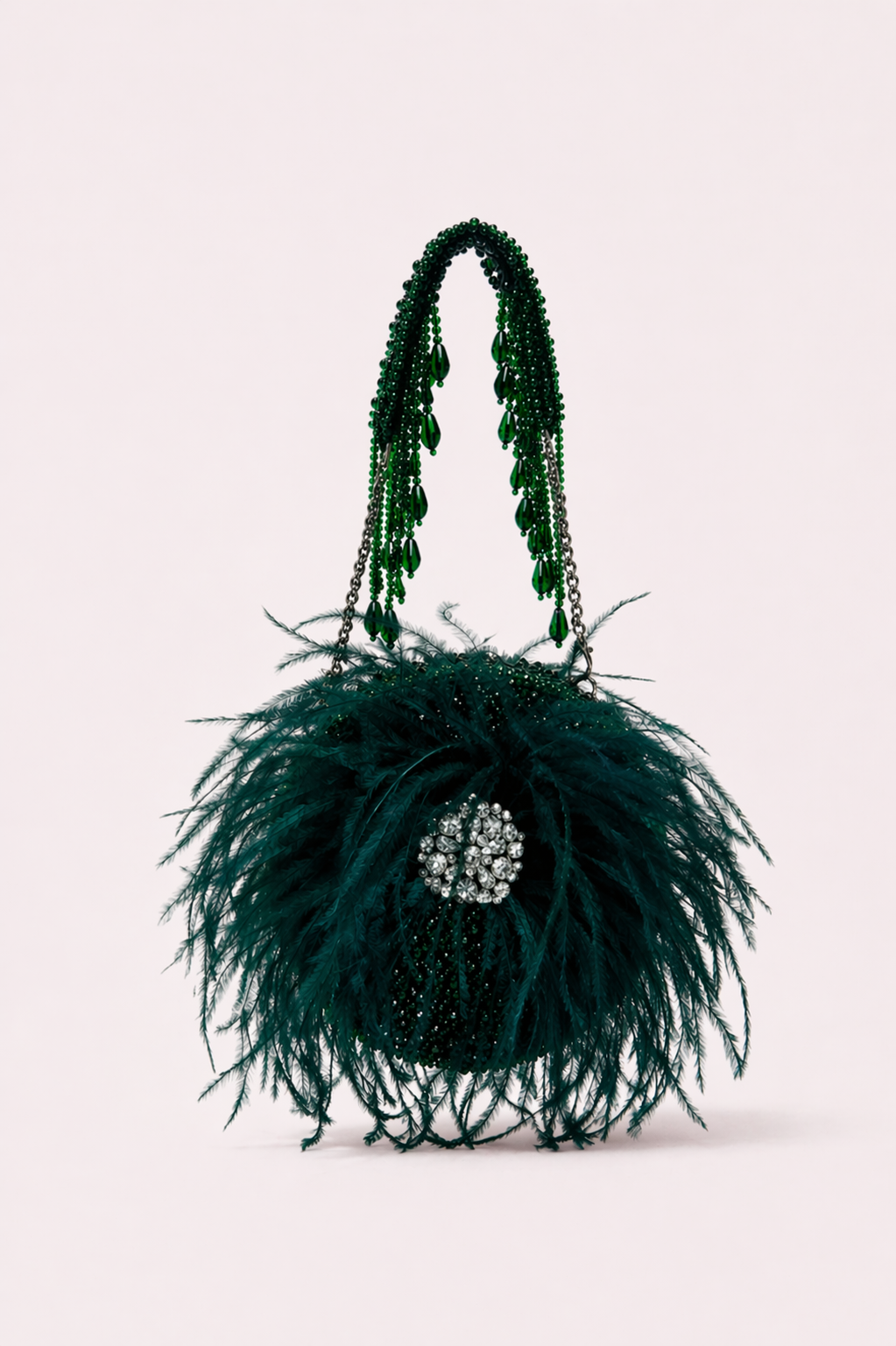 Green feather cocktail bag with dramatic texture and elegant crystal embellishments