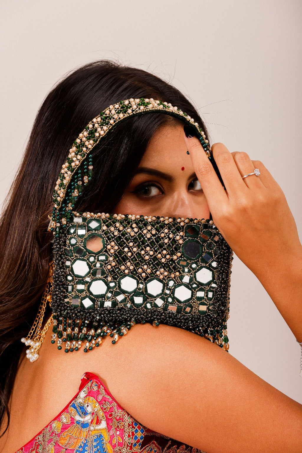 Green festive shoulder bag inspired by wedding celebrations and glamorous evening styling