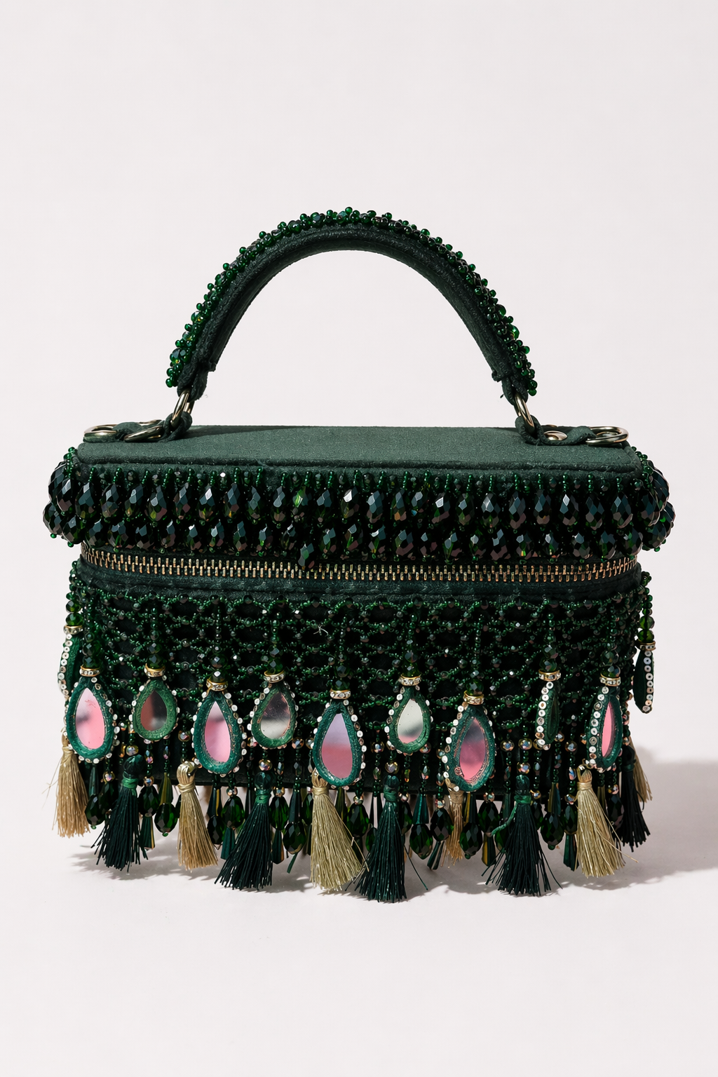 Green mehendi mirror work bag with intricate embellishments and elegant tassel detailing