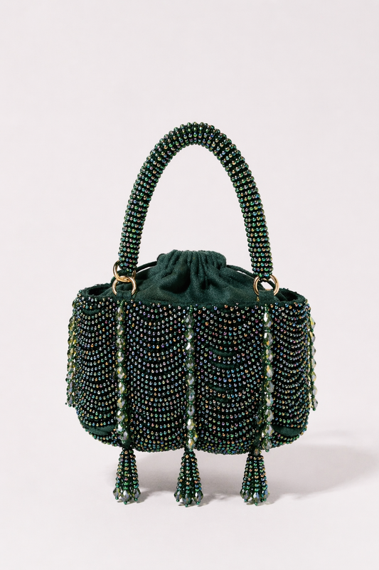 Green beaded party handbag with layered embellishments and elegant festive detailing