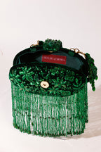 Handcrafted green shoulder bag designed for festive celebrations and wedding events