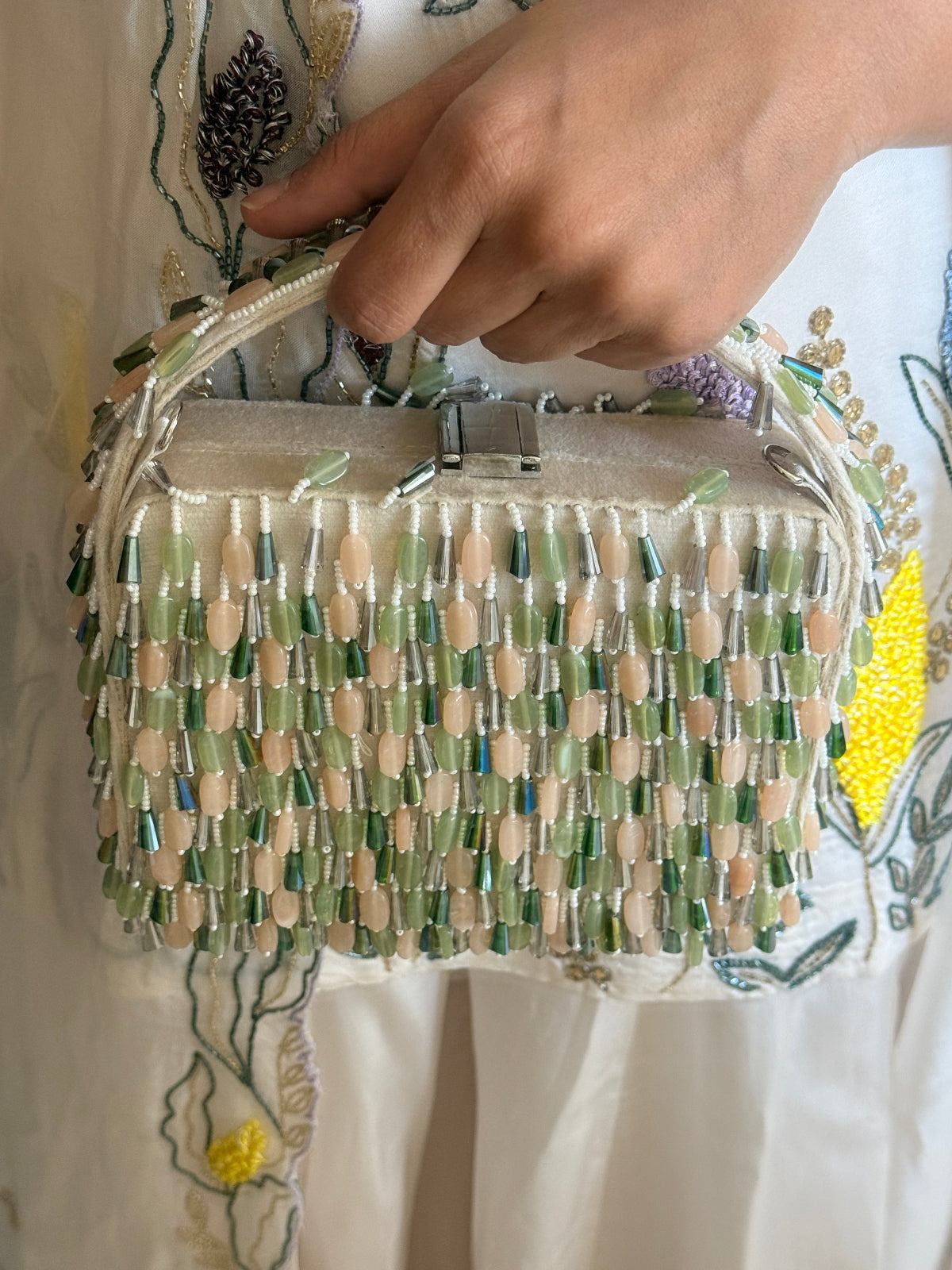Handcrafted beaded party purse combining artisanal craftsmanship with modern festive glamour