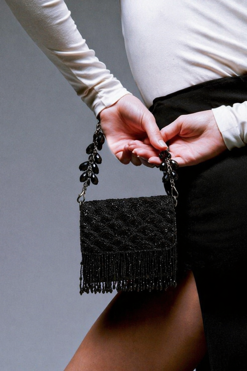 Handcrafted black festive purse combining artisanal craftsmanship with modern evening glamour